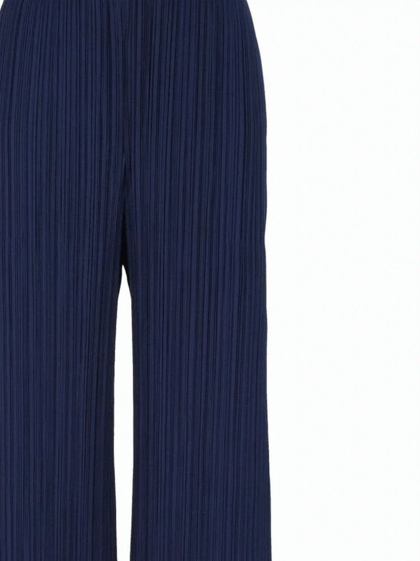 Pleats Please Wide-Leg Pleated Pants With Fluid Texture
