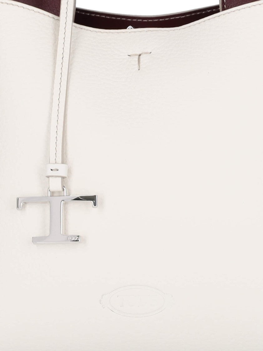 Tod's Textured White Leather Handbag With Silver Charm