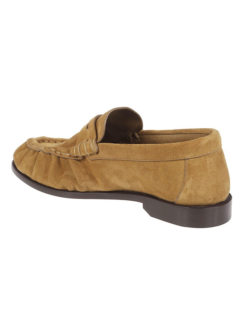 Saint Laurent Hand-Stitched Moccasin Flats With Decorative Cassandre Detail