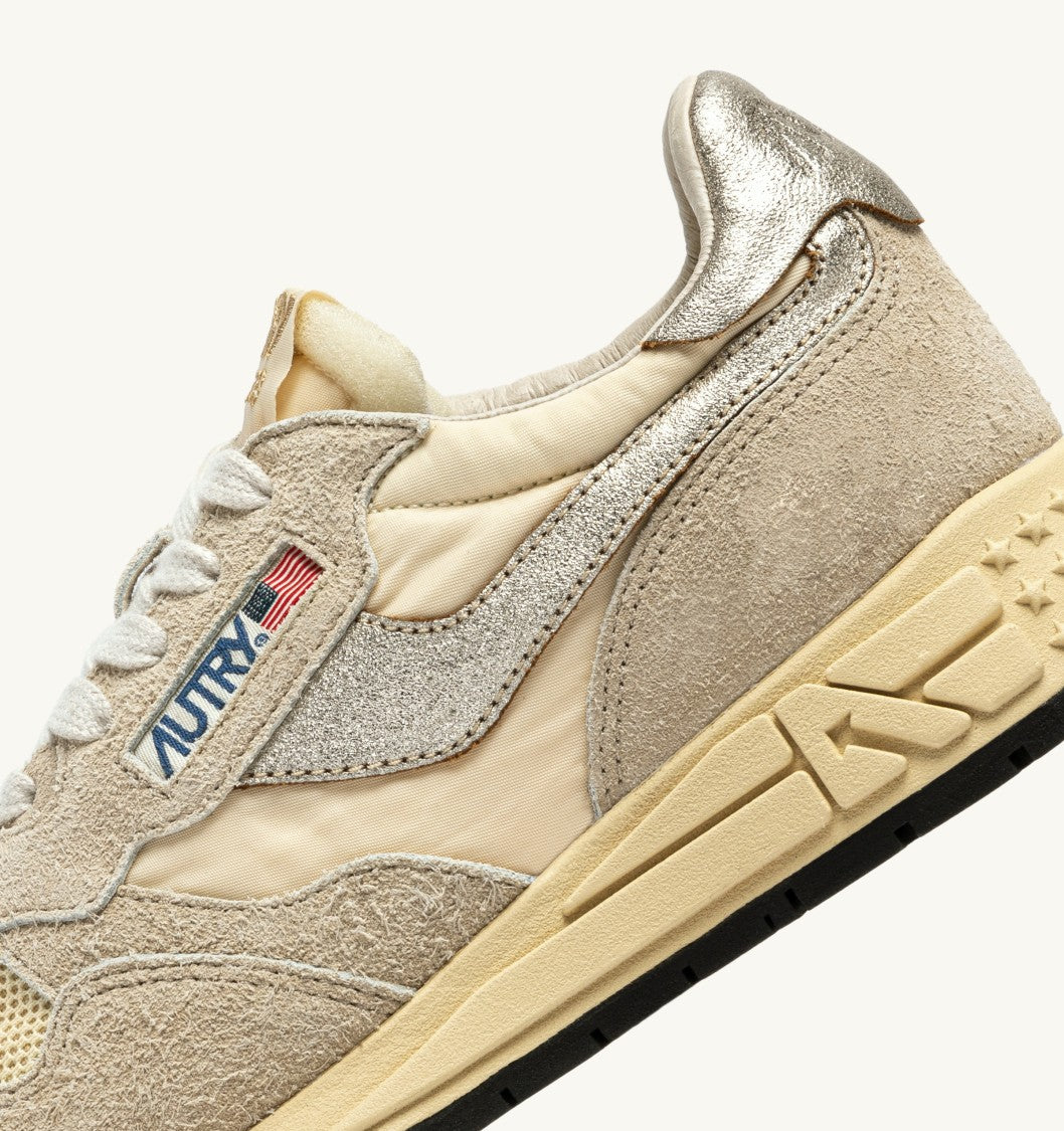 Autry Textured Beige Sneakers With Metal Accents