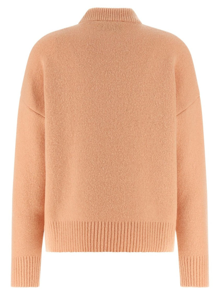 Ami Textured Knit Sweater With Classic Crew Neckline And Ribbed Details