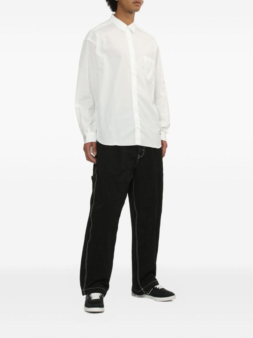 Comme Des Garçons Long-Sleeved White Shirt With Classic Button Design And Pleat Detailing