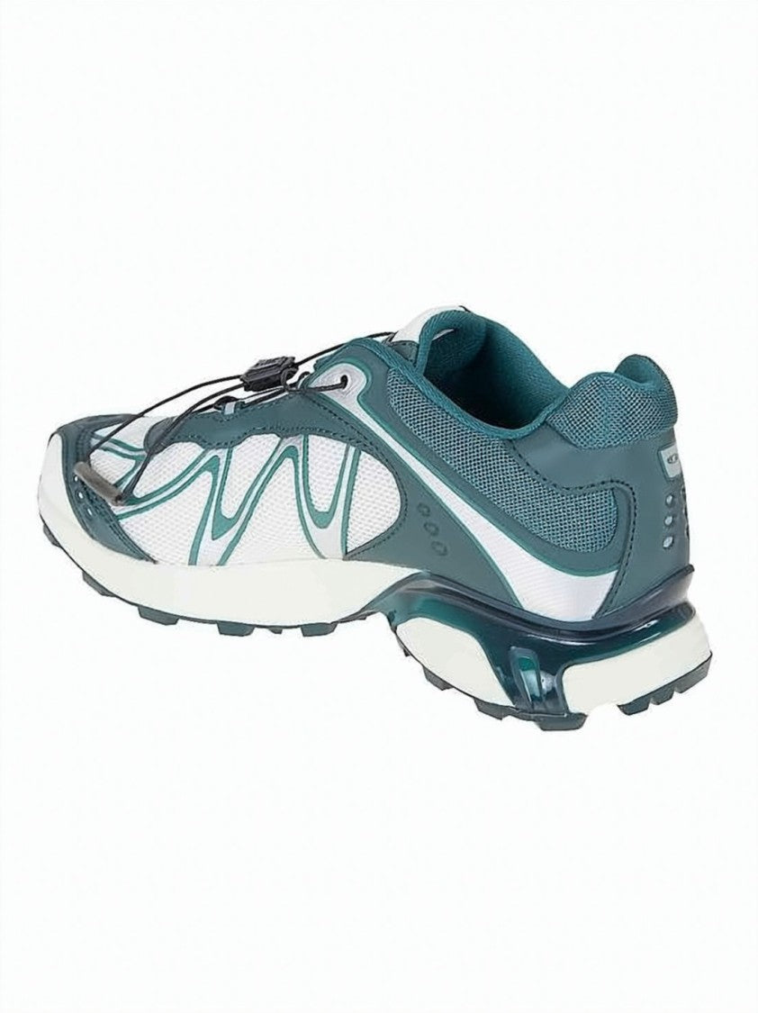 Salomon Low-Profile Sneakers With Teal Overlays And Rugged Sole