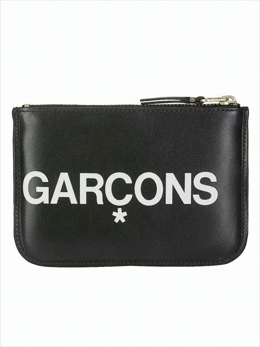 Comme Des Garçons Rectangular Cowhide Clutch With Gold Accents And Typography