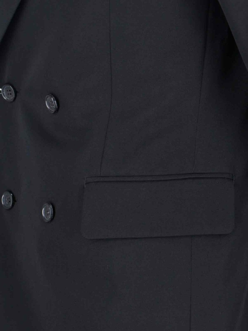 Comme Des Garçons Structured Black Jacket With Minimalist Aesthetic
