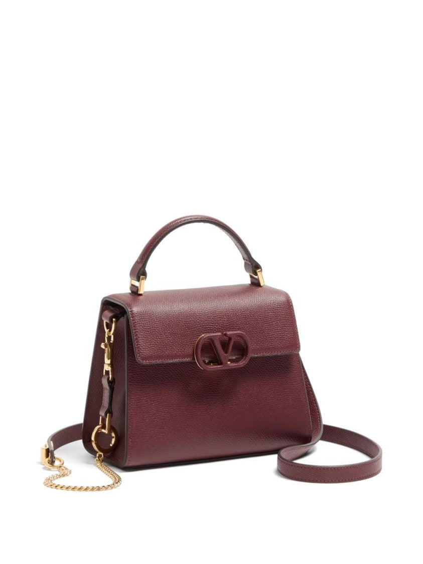 Valentino Garavani Textured Leather Wallet With Top Handle