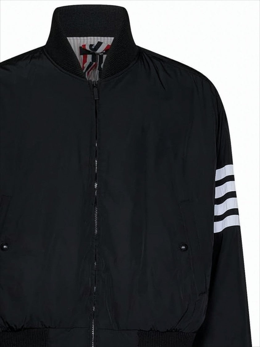 Thom Browne Sleek Black Bomber Jacket With Bold Stripe Detail