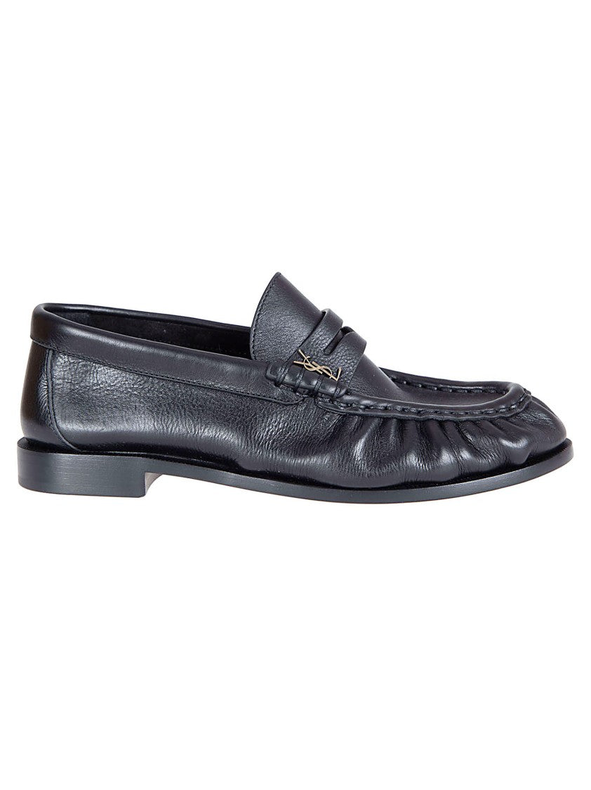 Saint Laurent Hand-Stitched Moccasin-Style Flats With Bronze Detailing