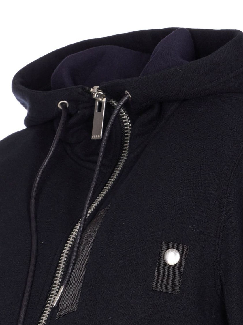 Sacai Cropped Black Hoodie With Layered Hem And Functional Accents