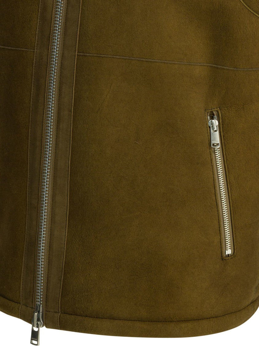 Nonnative Shearling Sleeveless Jacket With Natural Lining And Zippered Pockets