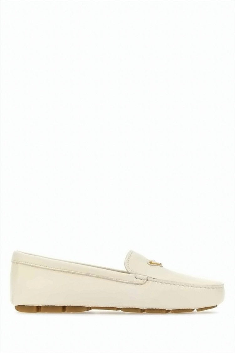 Prada Minimalist Leather Loafers With Rounded Toe And Subtle Stitching