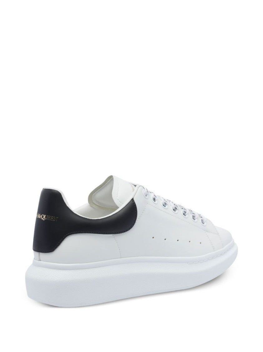 Alexander Mcqueen Minimalist White Leather Sneakers With Contrasting Heel Tab