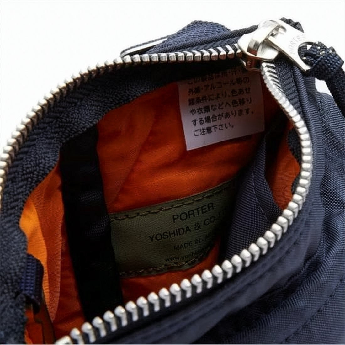 Porter Rectangular Crossbody Bag With Durable Fabric And Adjustable Strap