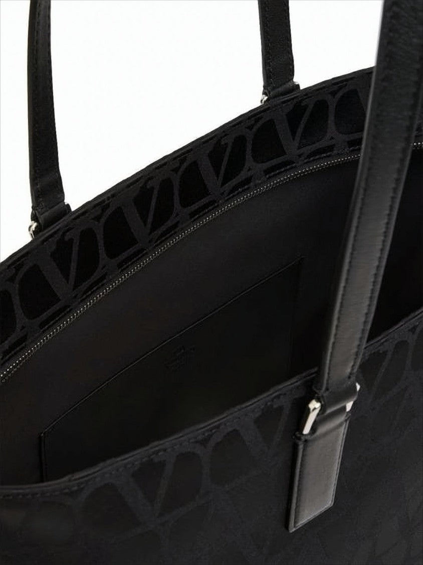 Valentino Garavani Structured Black Tote Bag With Embossed Logo Motif